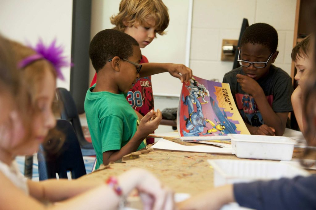 Students working together in a lower school classroom
